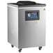 A VacPak-It floor model chamber vacuum packaging machine with stainless steel and black lids and a digital display.