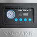 A close-up of the digital timer on a VacPak-It floor model vacuum packaging machine.