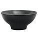 A Front of the House black porcelain footed bowl with a spiral ink design.