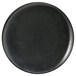 A black Front of the House round porcelain plate with spiral lines.