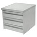 A white rectangular object with three drawers.