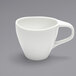 A white Front of the House Tides porcelain cup with a handle.