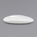 A white oval shaped dish with a curved edge.
