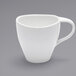 A Front of the House Tides white porcelain coffee cup with a handle.