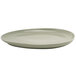 A white Front of the House Tides oval porcelain plate.