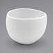 A Front of the House Tides white porcelain bowl on a gray background.