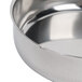 A Vollrath stainless steel butter pan with a handle and lid.