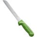 A Dexter-Russell Sani-Safe bread knife with a green handle.