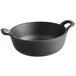 A black cast iron bowl with handles.
