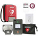 A black bag with a red heart and white text containing a Philips HeartStart FR3 AED.