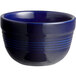 A close-up of a blue Acopa Capri stoneware bouillon bowl with lines on it.