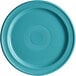 A Caribbean turquoise stoneware plate with a circular pattern.