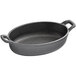 A black oval cast iron pan with handles.