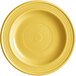 A set of 12 Acopa Capri citrus yellow stoneware plates with a circular pattern.
