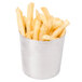 A close up of french fries in a stainless steel French fry cup.