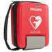 A red Philips soft case with a white heart logo.