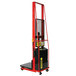 A red and black Wesco Industrial Products power lift platform stacker with a black handle.