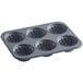 A Fox Run muffin pan with six fluted cups.