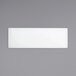 A rectangular white plate on a gray background.