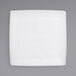 A white square Front of the House porcelain plate with a white rim.