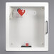 A white Physio-Control surface mount AED cabinet with a red heart on it.