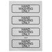 A group of white rectangular labels with black text reading "Hand Washing Only"
