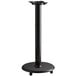 A black Lancaster Table & Seating cast iron table base tube.