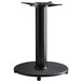 A black Lancaster Table & Seating round cast iron table base.