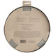 A round Fox Run pie crust shield with instructions on it.