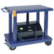 A blue Wesco Industrial Products lift table with a black control box on it.