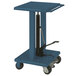 A blue lift table with swivel casters.