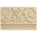 A white silicone molding tray with flower and leaf designs.