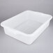 A white plastic Vollrath Color-Mate food storage container with a lid.