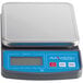 An AvaWeigh 10 lb. digital portion scale on a counter with a blue screen.