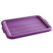 A purple Vollrath Traex food storage box lid on a purple tray.