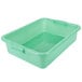 A green Vollrath Traex food storage container with a raised lid.