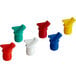 A group of Vollrath Bar Keep II assorted color spouts in white packaging.