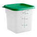A translucent plastic container with a green lid.