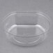 A clear Fabri-Kal plastic parfait insert with a lid.