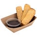 A tray of Farm Rich Original French Toast Sticks with a container of brown liquid.