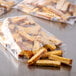 A bag of Rich's Farm Rich Original French Toast Sticks on a table.