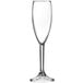 An Arcoroc clear plastic champagne flute with a stem.