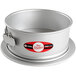 A round silver Fat Daddio's anodized aluminum springform cake pan.