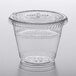 A Fabri-Kal clear plastic parfait cup with a flat lid.
