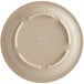An Acopa Foundations tan melamine plate with a circular design on the rim.