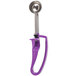 A purple and silver Vollrath Jacob's Pride extended length squeeze handle ice cream scoop.