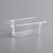 A Vigor 1/9 size clear plastic food pan on a counter.