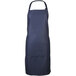 A navy blue Mercer Culinary bib apron with a front pocket.