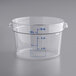 A clear plastic Vigor food storage container with blue measurements.