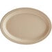An Acopa Foundations tan melamine oval platter with a white background and a narrow rim.